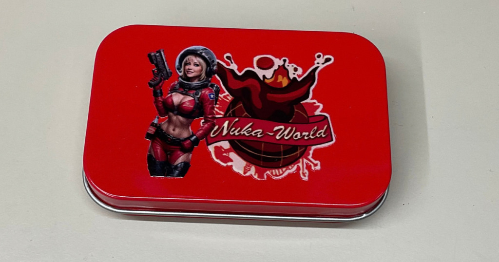 Nuka World Tin with 8 Nuka Cola Bottle Caps