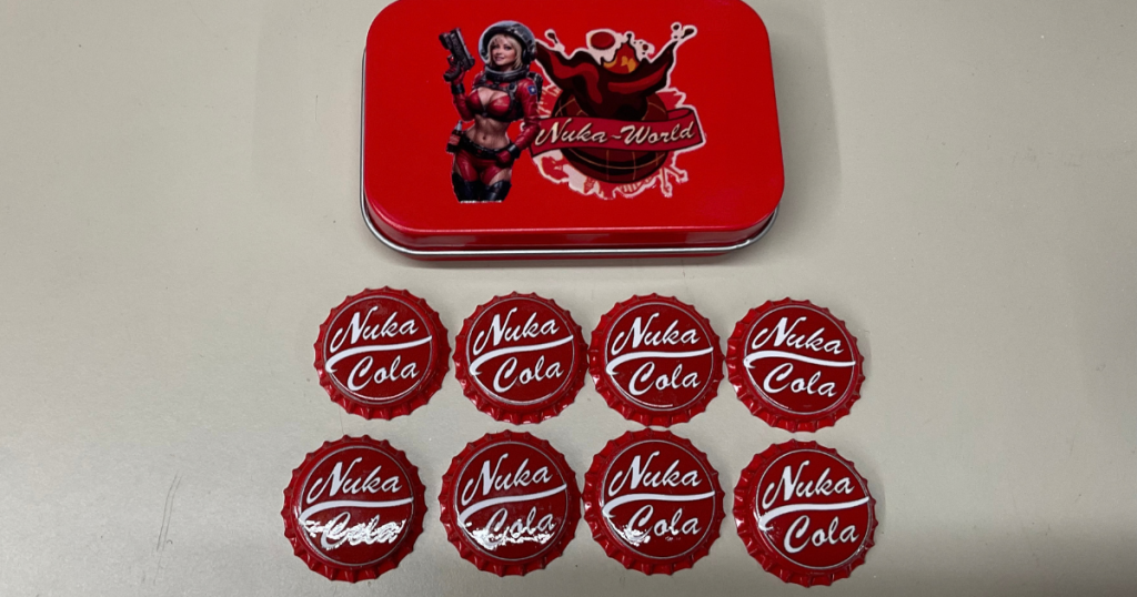 Nuka World Tin with 8 Nuka Cola Bottle Caps