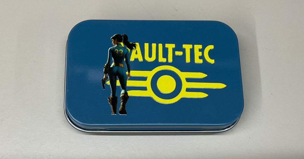 Vault Tec Lucy Tin Box with 8 Vault Tec Caps